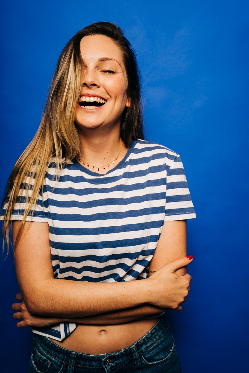 Pretty Smiling Girl with Blond Hair